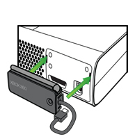 Arrows in an illustration show where to attach the Xbox 360 Wireless Networking Adapter to the back of an Xbox 360 console.